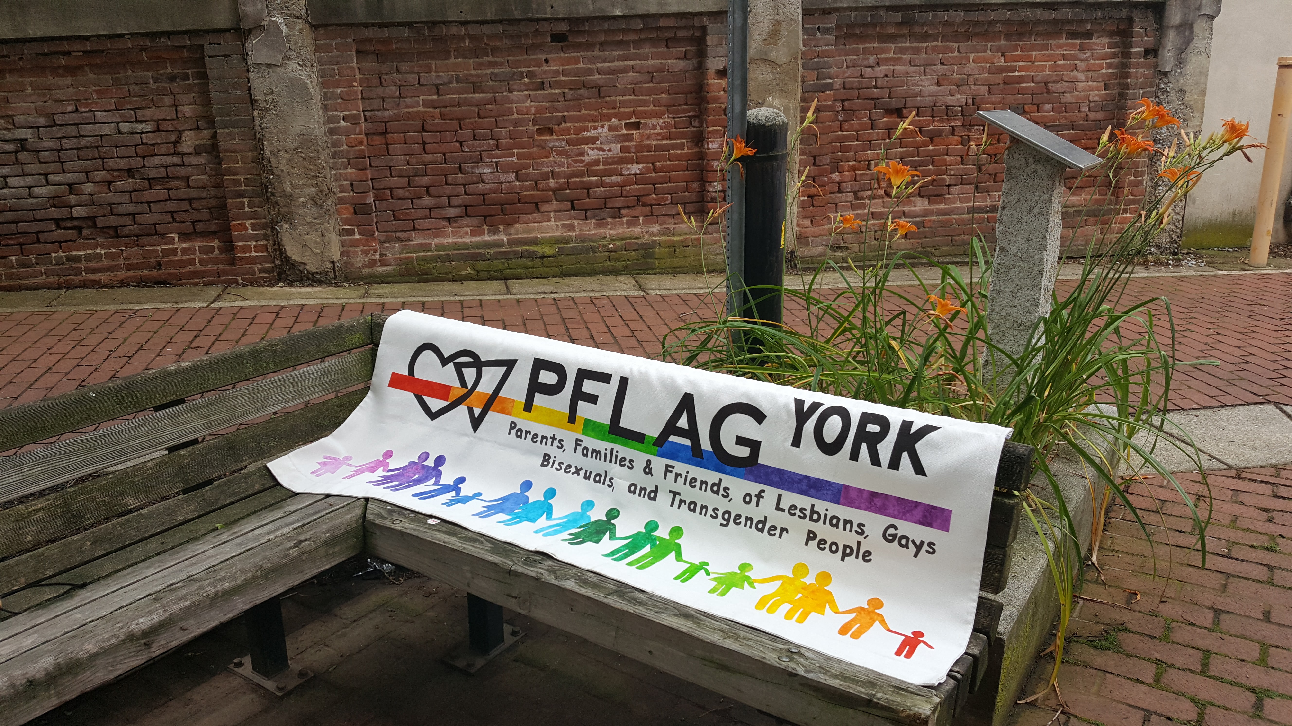 The PFLAG York Banner shows how all variety of families are equally welcomed